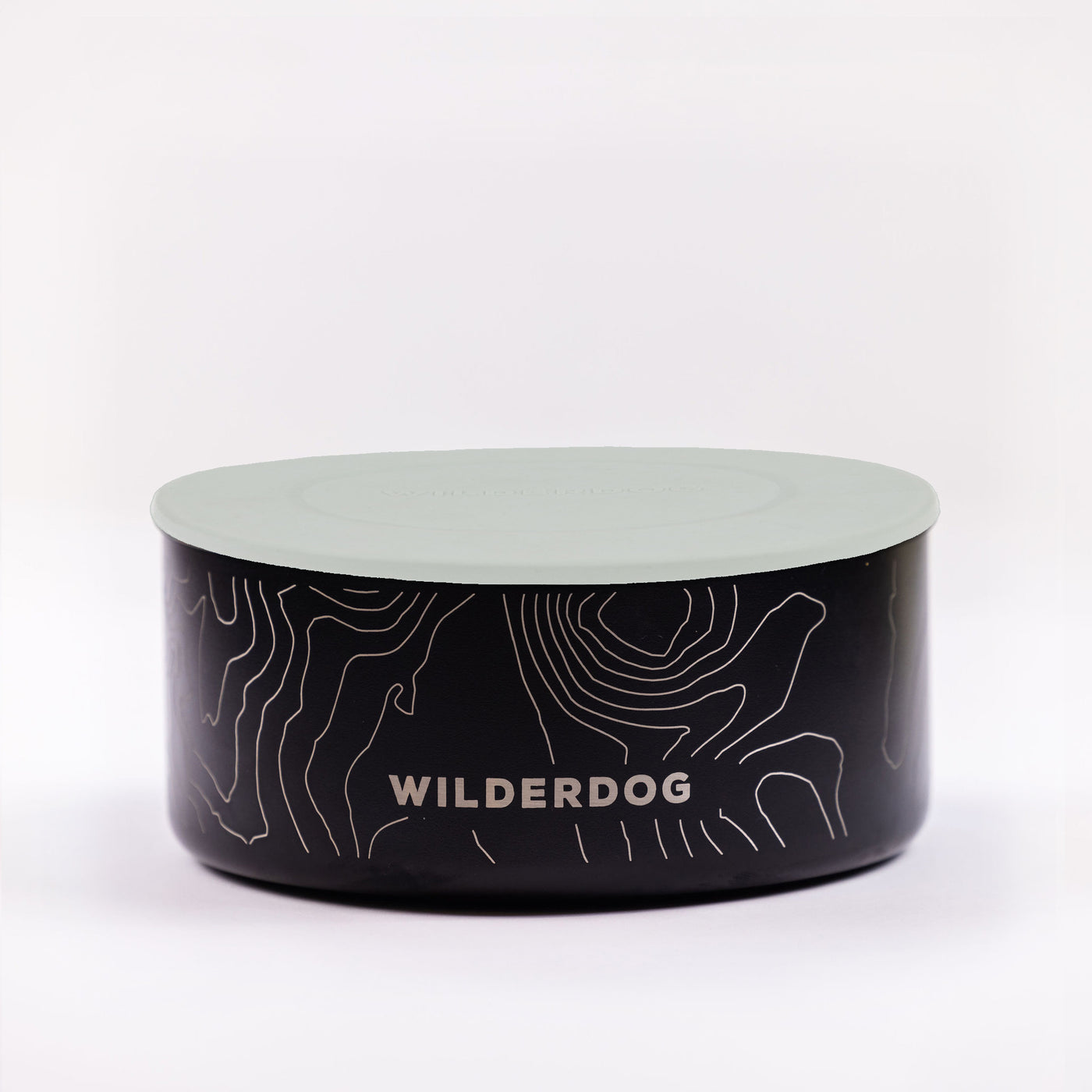 The Stainless Steel Dog Bowl is a black, round BPA-free container with a green lid adorned with a topographic map pattern. "WILDERDOG" is prominently displayed in white capital letters on the front. Perfect for adventurous pet owners, this stylish and durable dog bowl ensures safety for your furry friend.