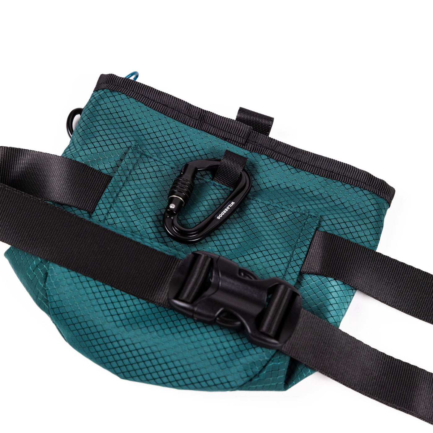 The Dog Training Treat Pouch is crafted from green, textured fabric and includes a black, adjustable waist strap with a plastic buckle. For enhanced convenience, it offers both magnetic and zipper closure options. Additionally, a black carabiner is attached to a small loop on the pouch. The background is white.