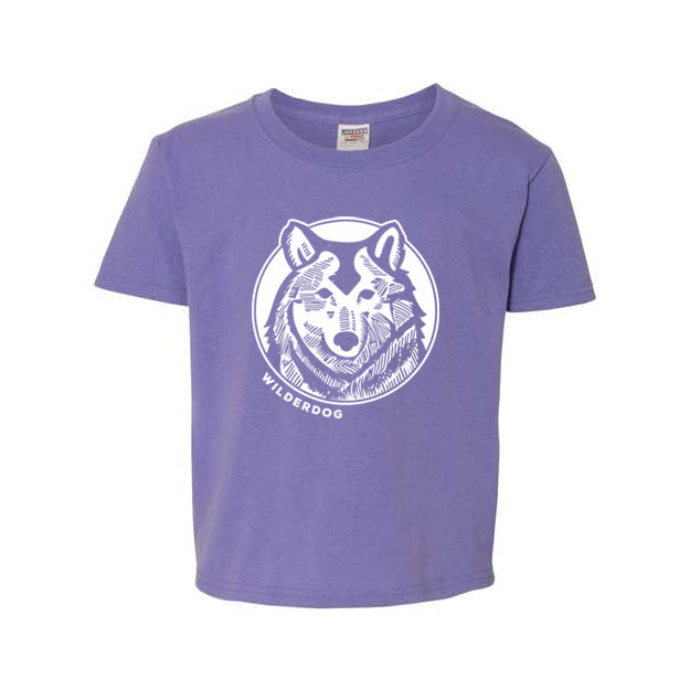 This Kids Wolf Tee Shirt is a purple Youth 50/50 T-Shirt featuring a striking white wolf logo inside a circle. Below the graphic, "WILDERDOG" is boldly printed in capital letters.