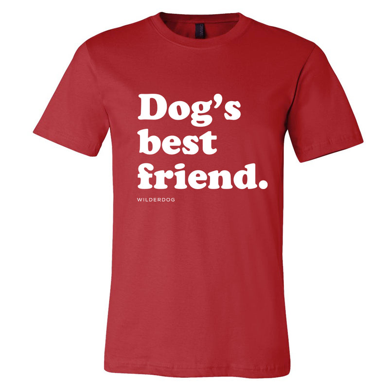 A vibrant red Party Dog Tee Shirt featuring the bold, white phrase "Dog's best friend." printed in the center. Below the phrase, the brand name "Wilderdog" appears in smaller white text. This sustainably produced, unisex T-shirt is showcased against a clean white background to highlight its striking colors.